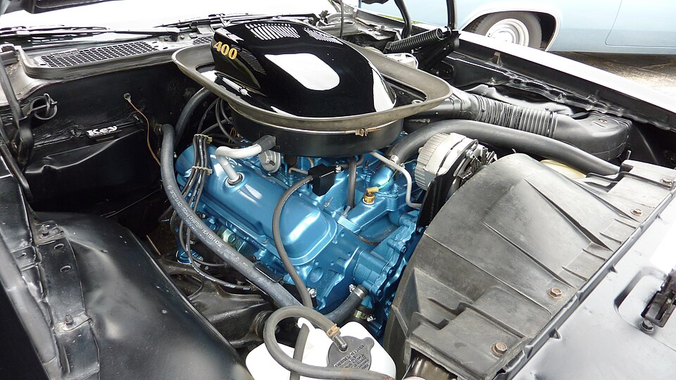 Pontiac 400 cubic inch V8 under the hood of a second-generation Trans Am with the 400 shaker scoop
